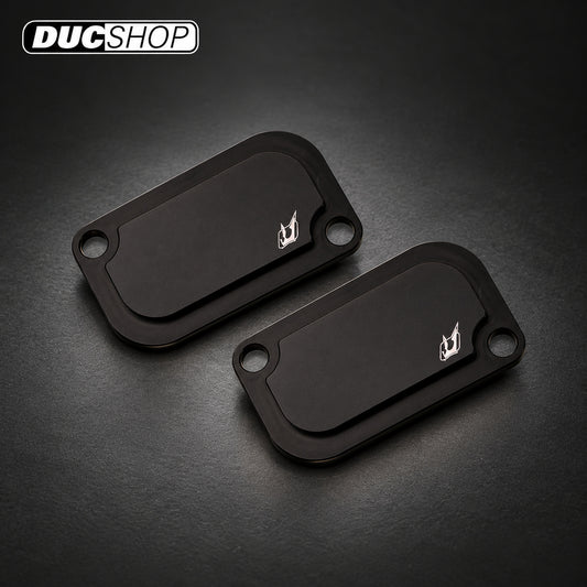 Driven Racing DSBLOCK-14 kit showing two black block-off plates | Emissions Removal | ducshop.com