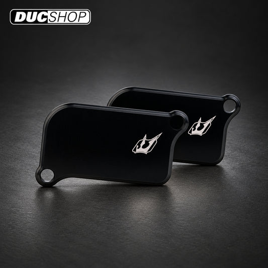 Driven Racing DSBLOCK-15 kit showing two black rectangular block-off plates | Emissions Removal | ducshop.com