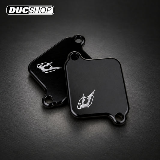 Driven Racing DSBLOCK-27 kit showing two black block-off plates | Emissions Removal | ducshop.com