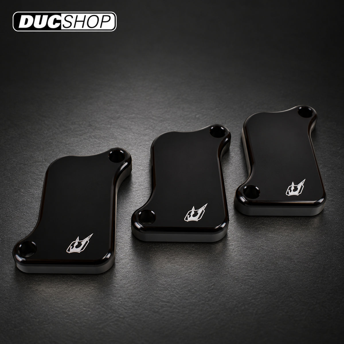 Driven Racing DSBLOCK-33 kit showing three black block-off plates | Emissions Removal | ducshop.com
